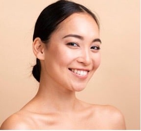 a woman smiling for the camera