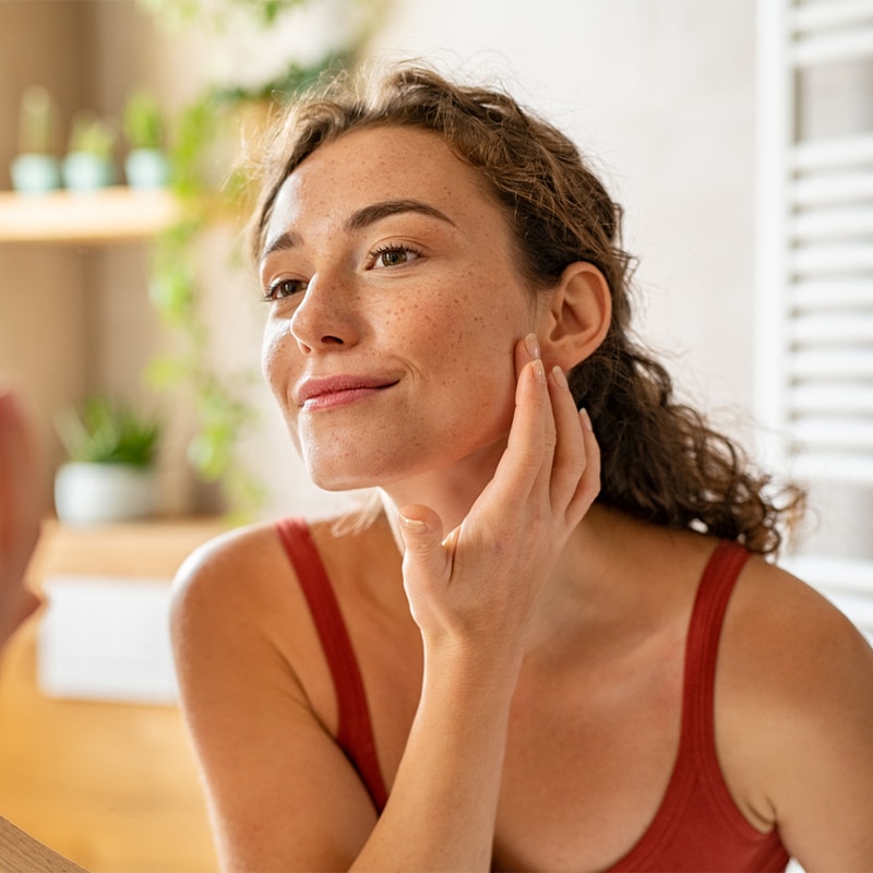 a woman looking at the camera
